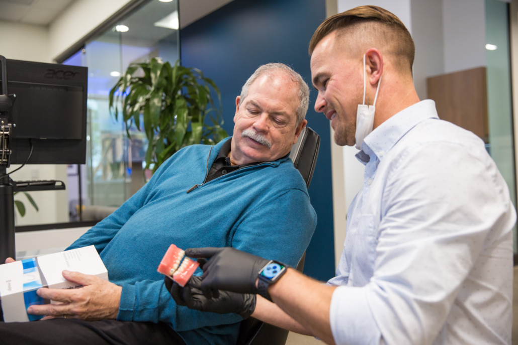 Patient consultation with orthodontist at Surf City Smiles